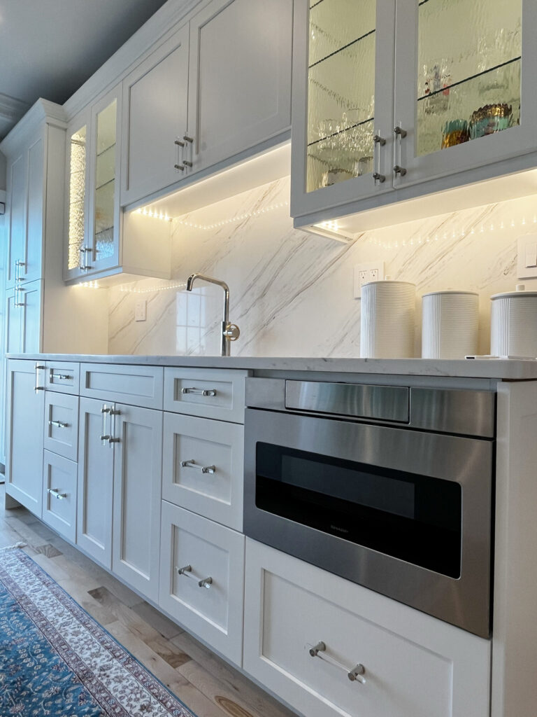 Custom wet bar cabinetry glass doors