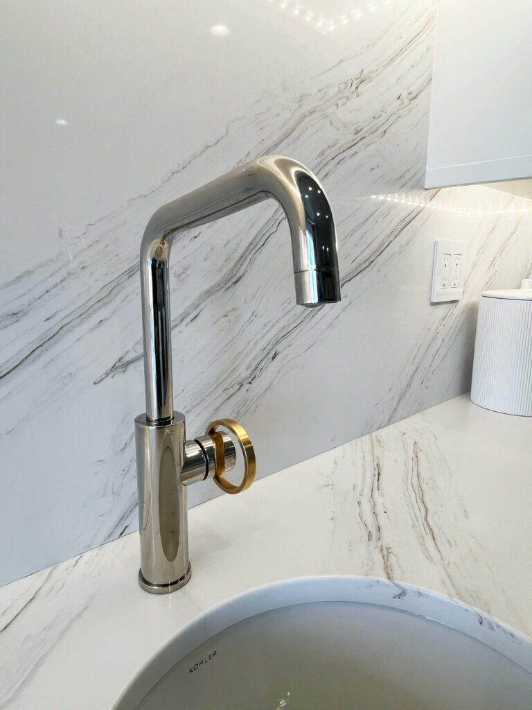 Wet bar faucet slab backsplash