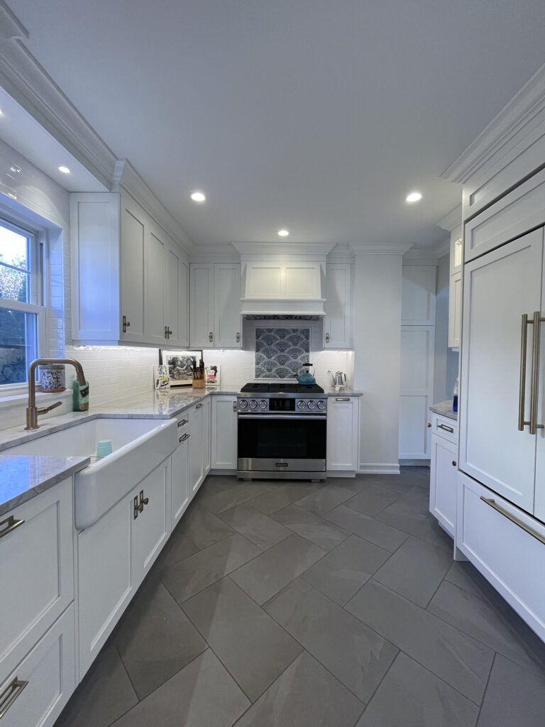 Kitchen range farmhouse sink herringbone floor